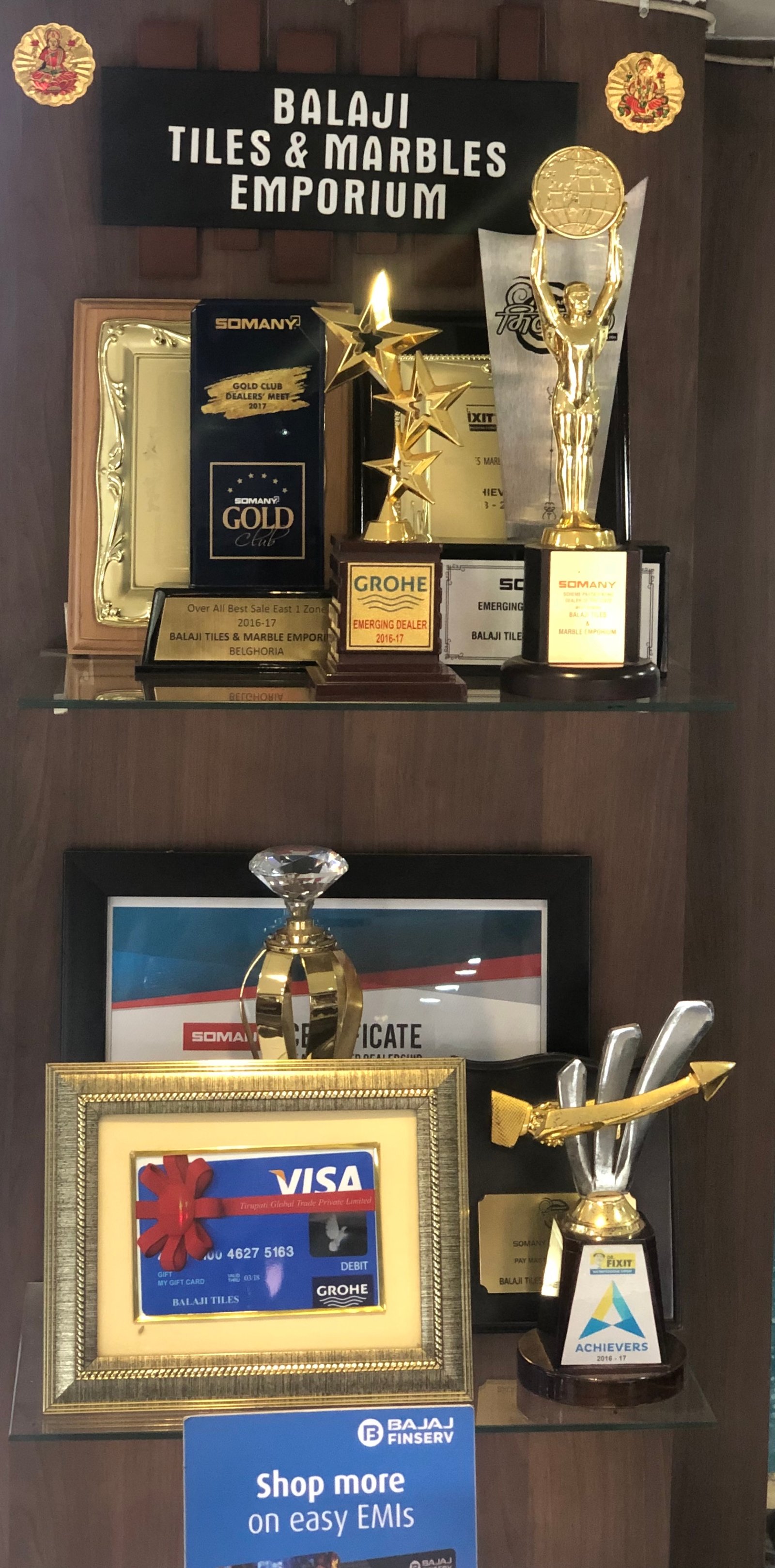 Trophy shelf with dealer awards